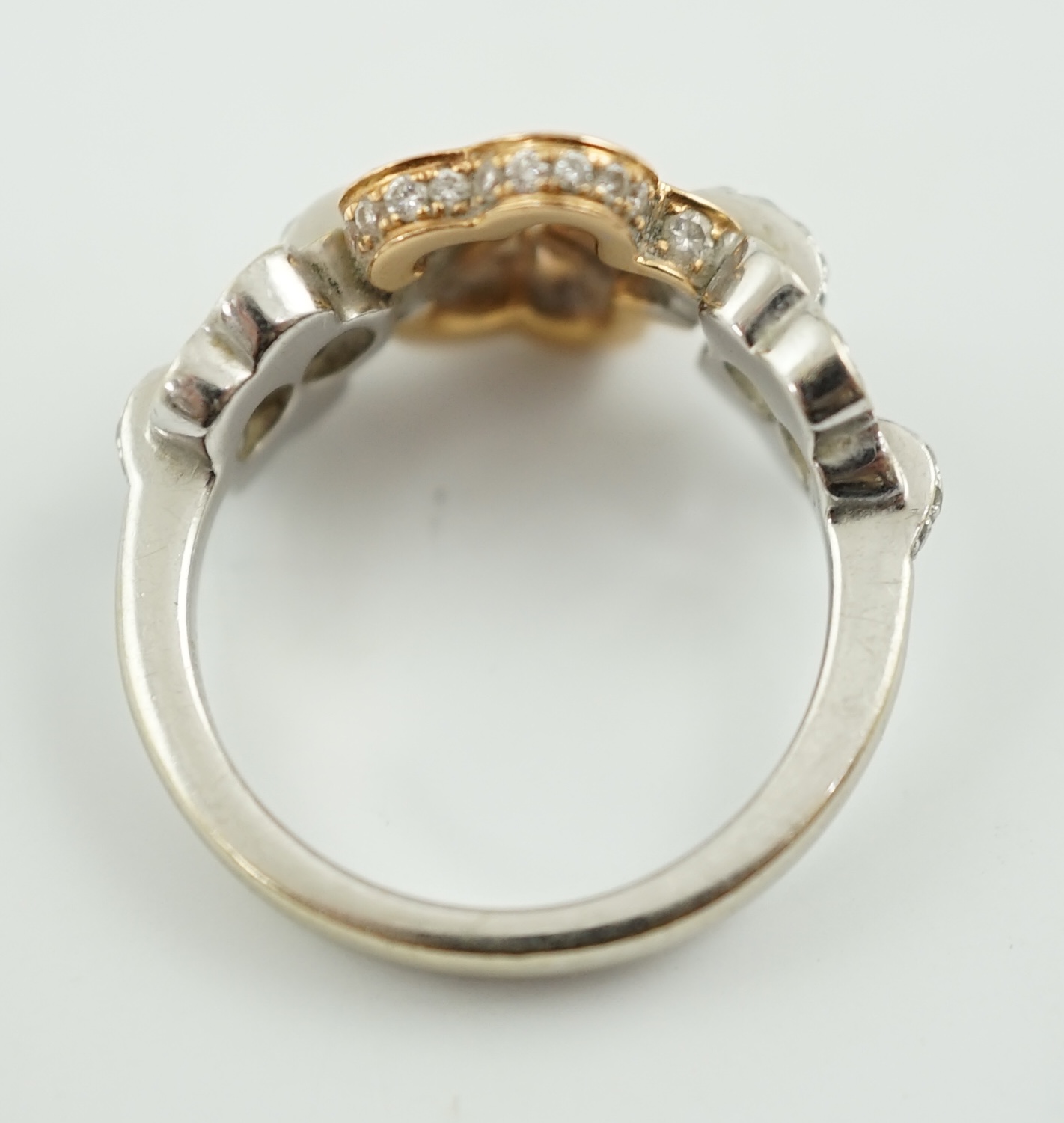 A modern Boodles & Dunthorne two colour 18ct gold and diamond chip set dress ring